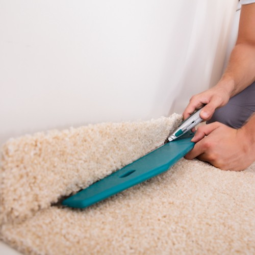 Carpet-DuringInstallation | Chacon Flooring